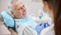 a dentist consulting with a patient