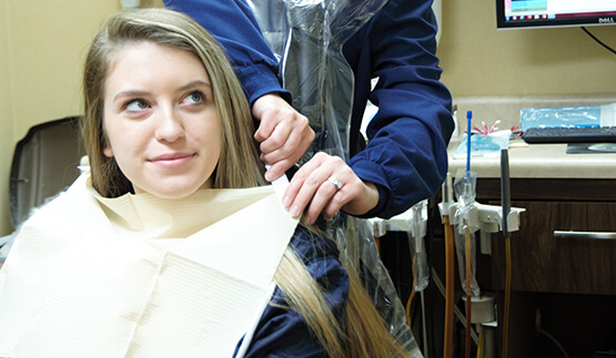 Teen girl in dental chair