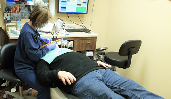 Patient receiving dental treatment