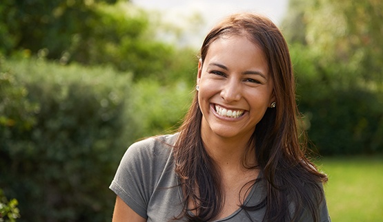Woman smiling outside