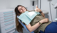 Animated dental crown, abutment, and dental implant replacing a missing tooth