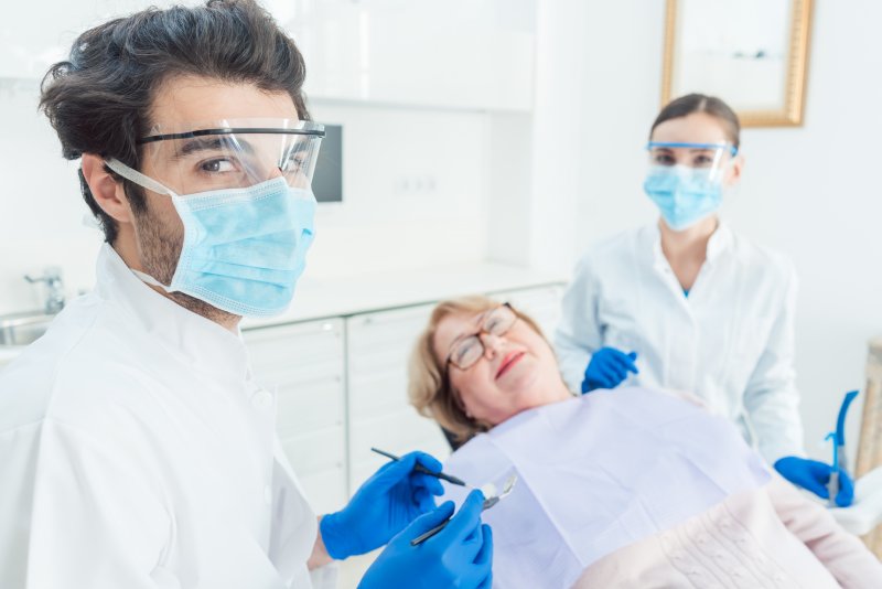 Dentist in Collinsville wearing PPE