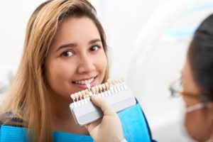 Patient at the dentist to receive porcelain veneers